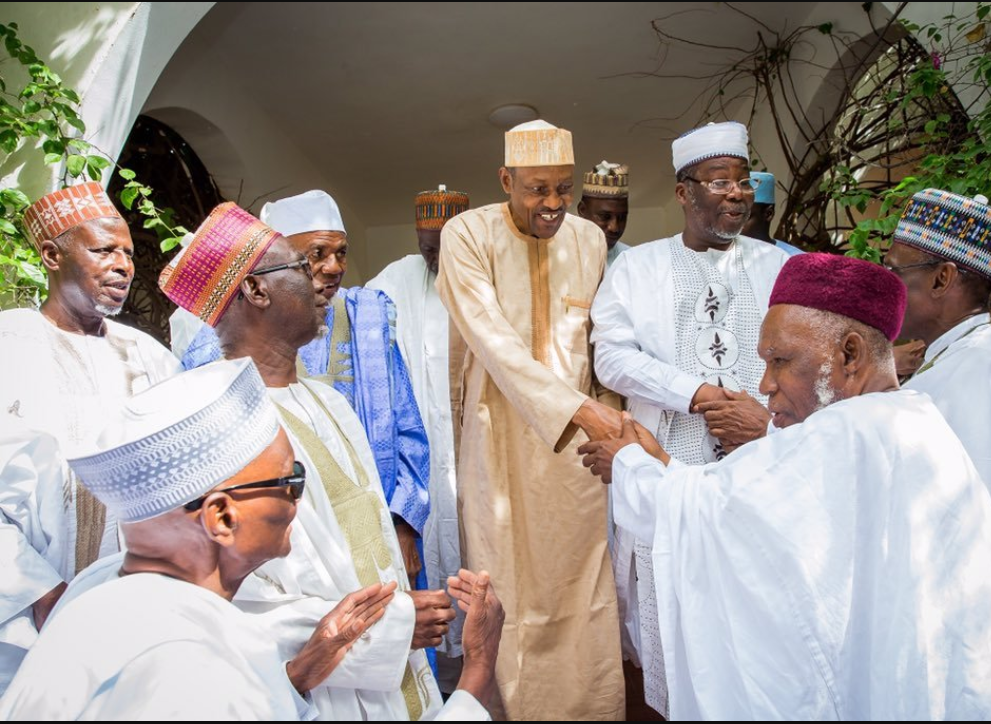 Coomassie (right) on Buhari's side, in a recent picture with the President's old secondary school mates.