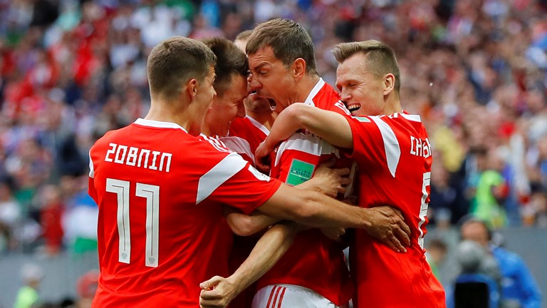 Russian players celebrating one of their goals.