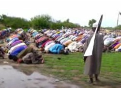 Boko Haram fighters observing Eid prayers at an undisclosed location in northern Nigeria.