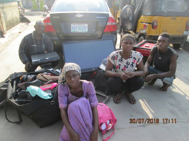 The suspects and the allegedly stolen items.