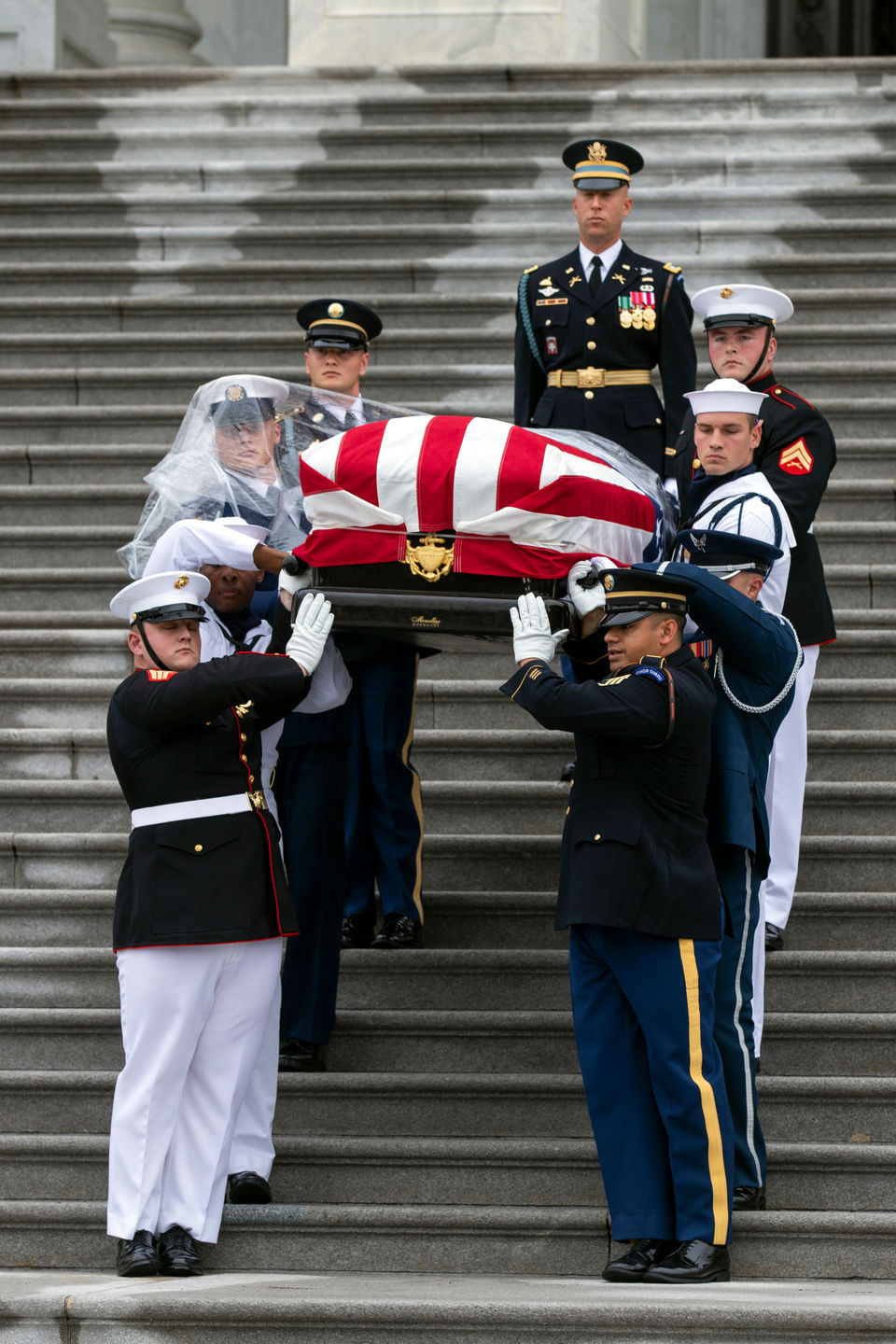 McCain The casket of Sen. John McCain, R-Ariz., is carried to a hearse from the U.S. Capitol in Washington, Saturday, Sept. 1, 2018, in Washington, for a departure to the Washington National Cathedral for a memorial service. (Jim Lo Scalzo/Pool Photo via AP)