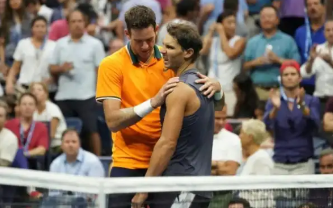 Del Potro, left, offering some words of comfort to Nadal after their clash at the US Open semi final on Friday