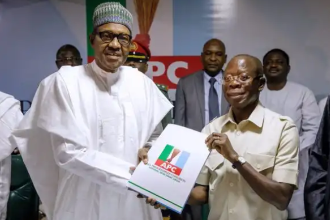 Buhari submitting his nomination form to Oshiomhole at the APC national secretariat in Abuja, on Wednesday.