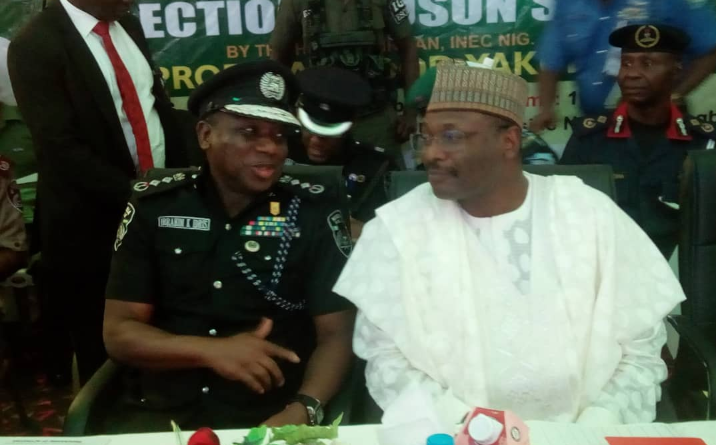 IGP Ibrahim Idris and INEC Chairman, Prof Mahmood Yakubu at the stakeholders forum on the September 22 governorship election in Osun State.