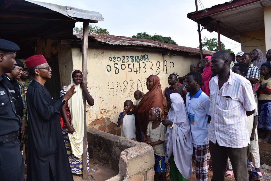 Kaduna curfew bites journalists, civil servants. Above Governor Nasir El-Rufai at Kasuwan Magani on Monday, his second visit since the outbreak of violence in Kaduna