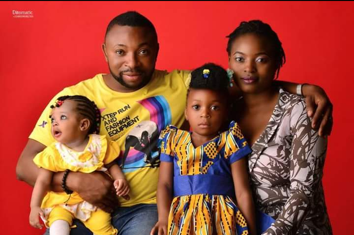 Late DJ Silver Apeh with his wife and children.