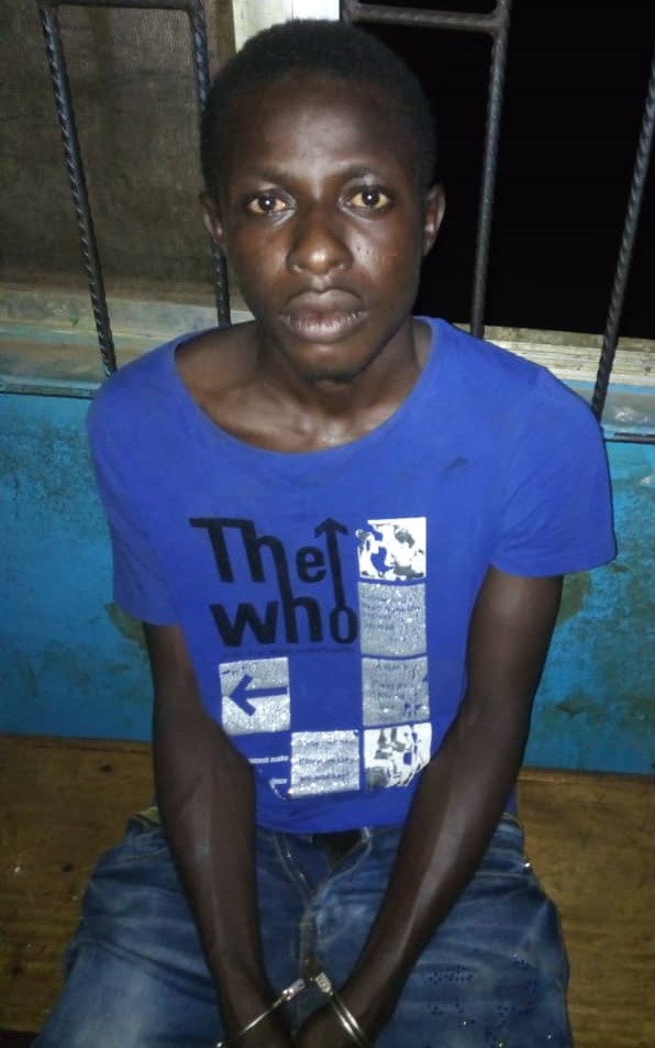 The arrested suspect, Taiwo Olatokunbo, who allegedly killed over N200 beer.