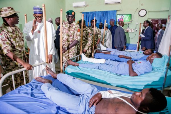 Buhari at the hospital in Maiduguri to check soldiers injured during Boko Haram attacks