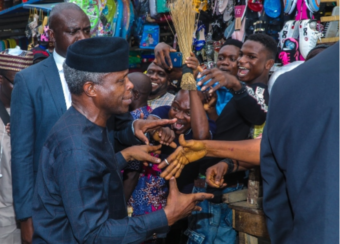 Osinbajo interacting with some beneficiaries of the TraderMoni scheme