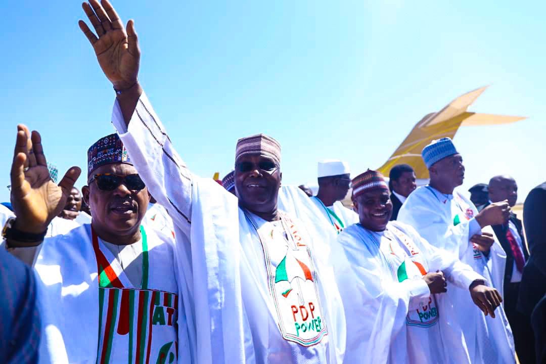 From left, PDP National Chairman, Uche Secondus, Atiku, Sokoto State governor, Tambuwal and Senate President Bukola Saraki acknowledging cheers at the campaign rally in Sokoto.