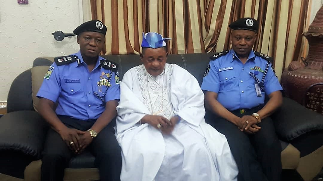 AIG Leye Oyebade, left, and CP Shina Olukolu on a courtesy visit to Iku Baba Yeye, His Imperial Majesty, the Alaafin of Oyo