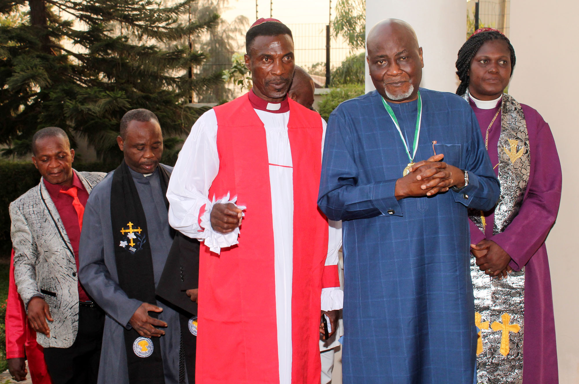 Prof Charles Dokubo, Coordinator, Presidential Amnesty Programme, Bishop Dr. Felix Piniki (R hand of Dokubo), Bishop Favour Aremola(L hand of Dokubo) and others after a group picture, with The Bishops and Clergy Council of Niger Delta, during a courtesy visit to the Amnesty office in Abuja, Monday 4, 2019.