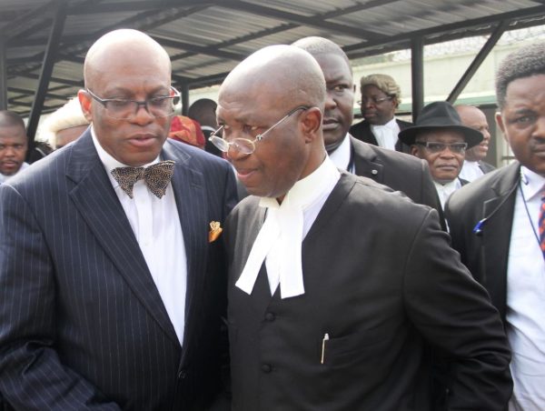 Paul Usoro (left) and his lawyer, Wole Olanipekun