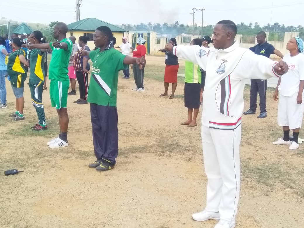 AIG Oyebade, right, exercising with the officers