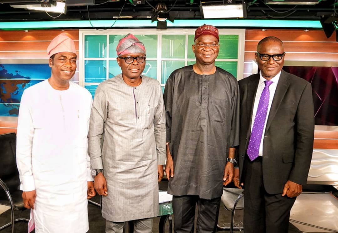 Deputy Governorship candidate of the APC in Lagos State, Dr. Obafemi Hamzat, Governorship candidate, Mr. Babajide Sanwo-Olu, Minister of Power, Works and Housing, Mr. Babatunde Fashola (SAN) and host of This Morning on TVC, Mr. Yori Folarin after a live interview session in the TVC studio, Lagos on Thursday 7th March, 2019.