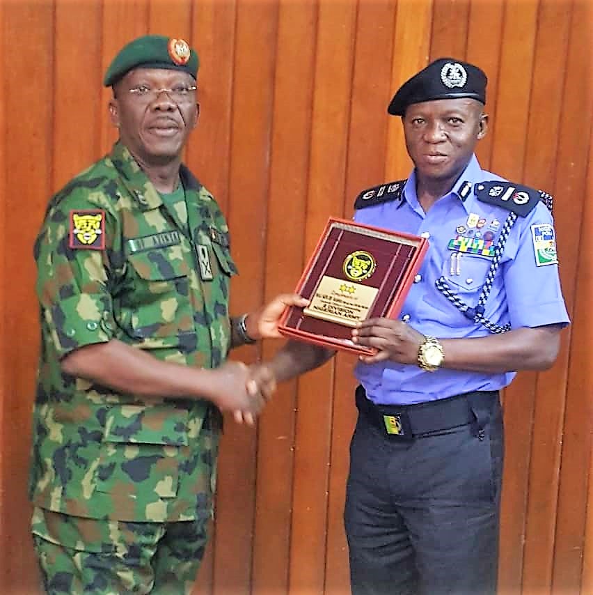 Inter-Agency Collaboration, AIG Zone XI, Leye Oyebade with GOC 2 Div, Major-General F.O. Azinta in the General's office in Ibadan