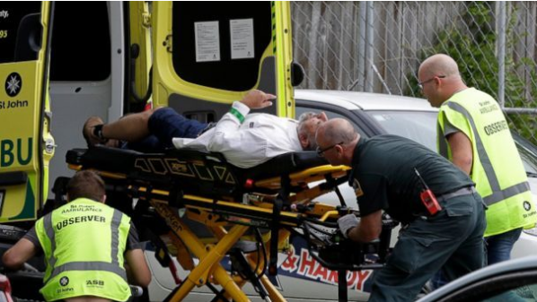 PHOTO: Ambulance staff take a man from outside a mosque in central Christchurch, New Zealand, Friday, March 15, 2019. A witness says many people have been killed in a mass shooting at a mosque in the New Zealand city of Christchurch. (AP)