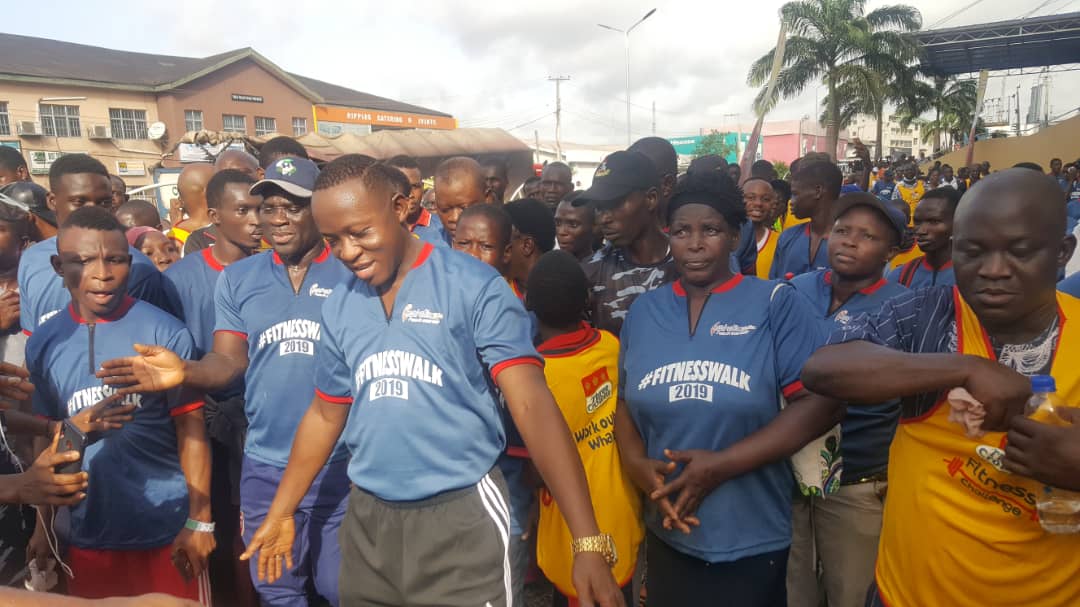 AIG Oyebade, third left, leading the walk