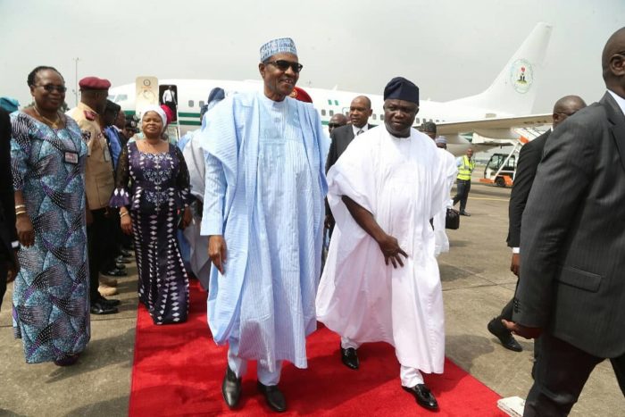 President Buhari with Governor Ambode on arrival in Lagos