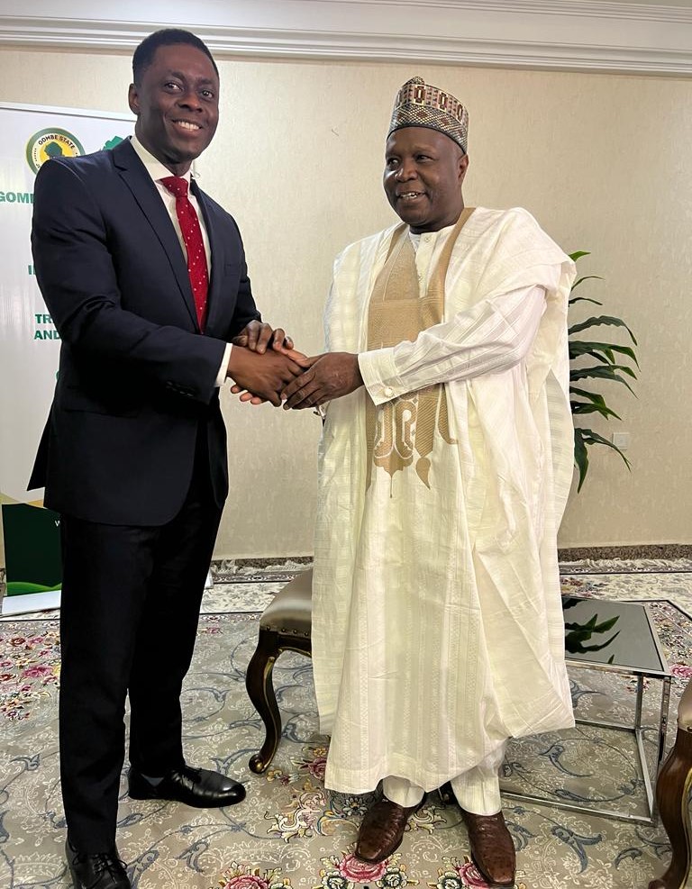 Chamberlain Usoh (left) with Gombe State governor, Muhammad Inuwa Yahaya.