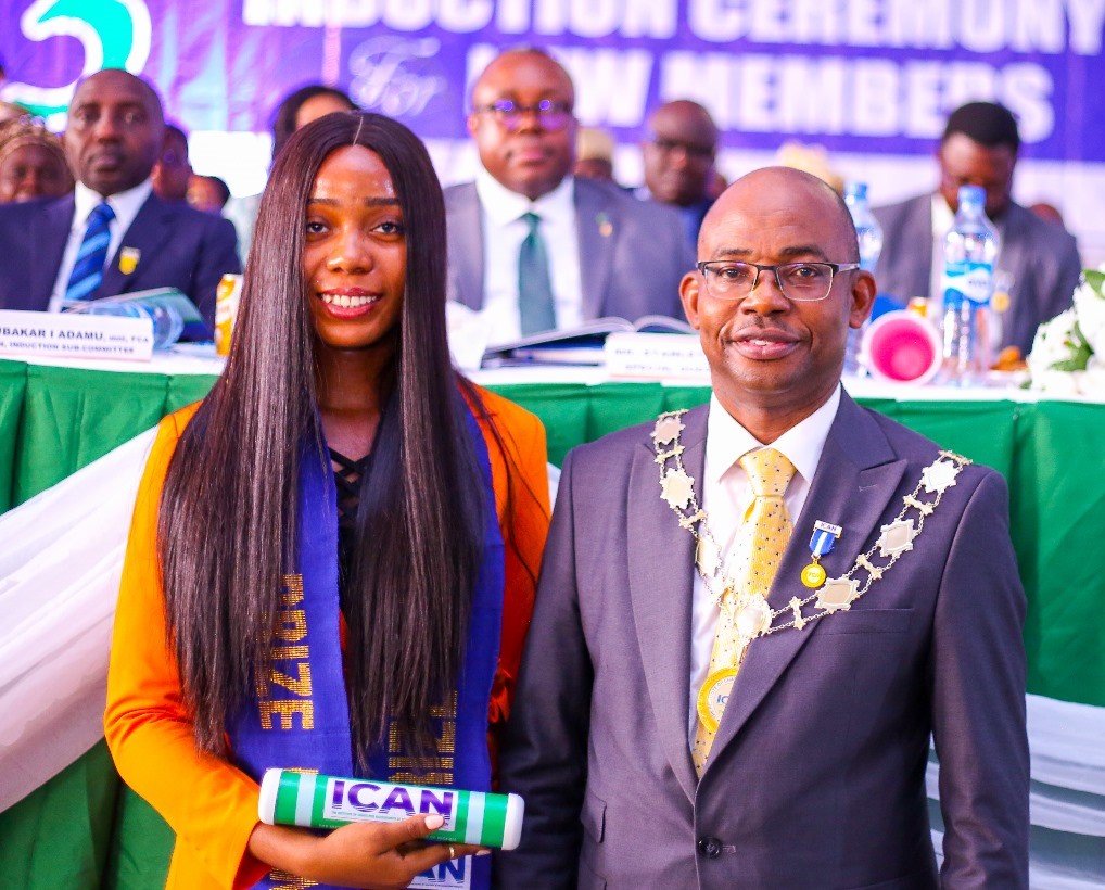 Awardee, Chidinma Akalezi and ICAN President, Innocent Okwuosa PhD, FCA.